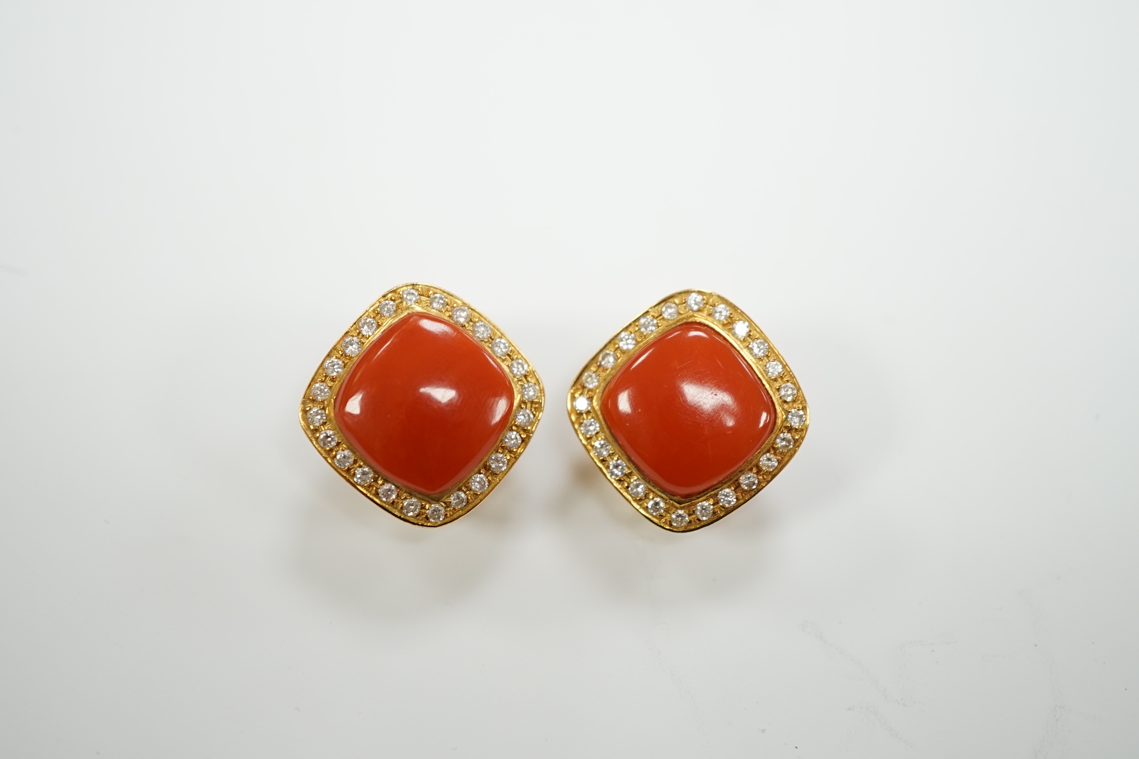 A pair of Italian 750 yellow metal, coral and diamond cluster set ear clips, 17mm, gross weight 15.6 grams.